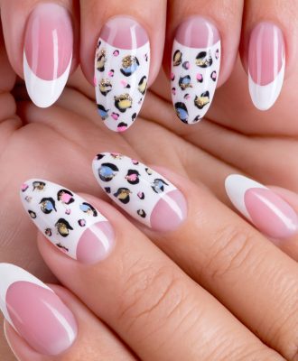 Beautiful woman's nails with beautiful french manicure