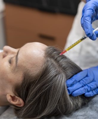 high-angle-patient-getting-prp-injection-alopecia